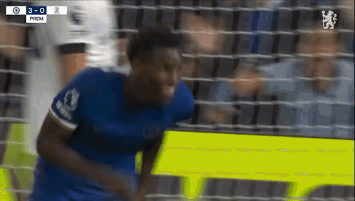 Soccer Player in Blue Jersey Running Towards Goal