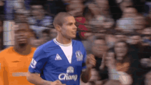 Soccer Player in Blue Jersey Saying Chang