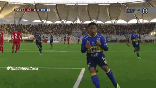 Soccer Player in Blue Jersey Saying Vina