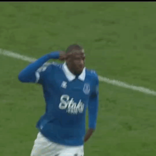 Soccer Player in Blue Jersey Stake.com