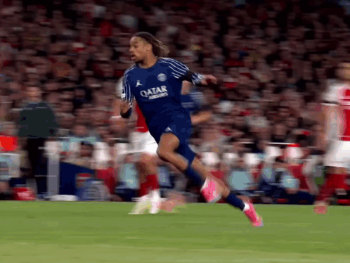 Soccer Player In Blue Qatar Jersey Runs GIF