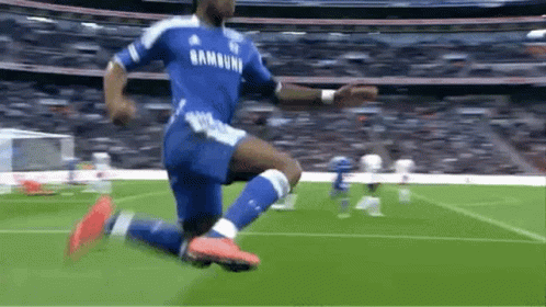 Soccer Player in Blue Samsung Jersey Jumping