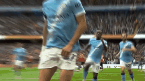 Soccer Player in Blue Shirt Dancing