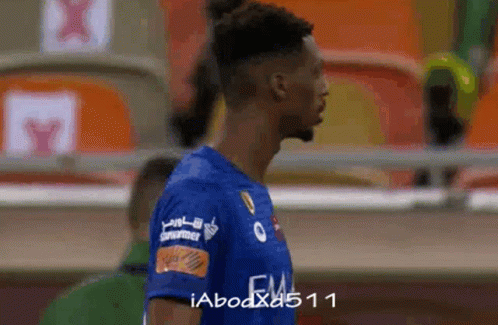 Soccer Player in Blue Shirt Emirates
