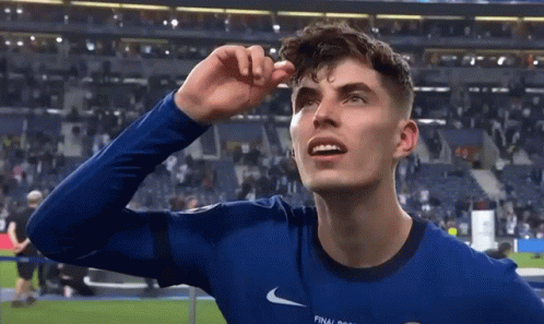Soccer Player in Blue Shirt Looking Up