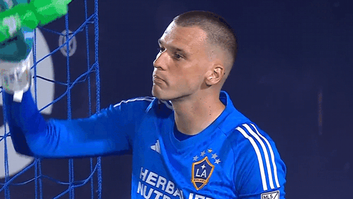 Soccer Player in Blue Shirt Saying LA