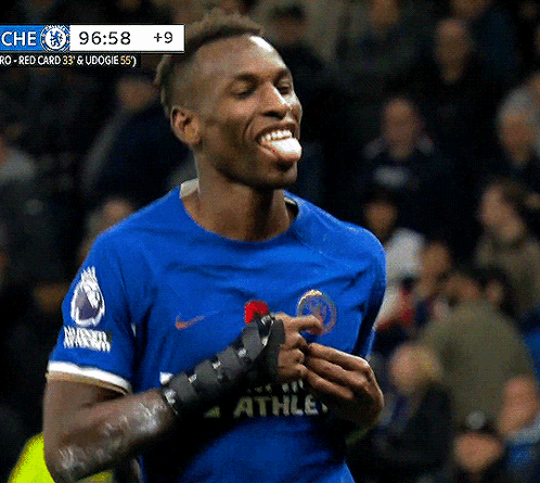 Soccer Player in Blue Shirt With Athle