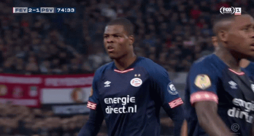 Soccer Player in Blue Shirt with energie direct.nl
