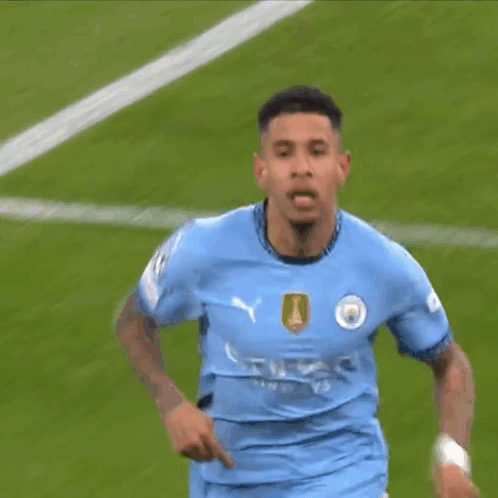 Soccer Player in Blue Shirt With Number 25