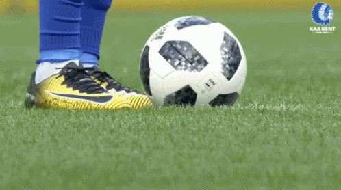 Soccer Player In Blue Socks Kicking Ball GIF