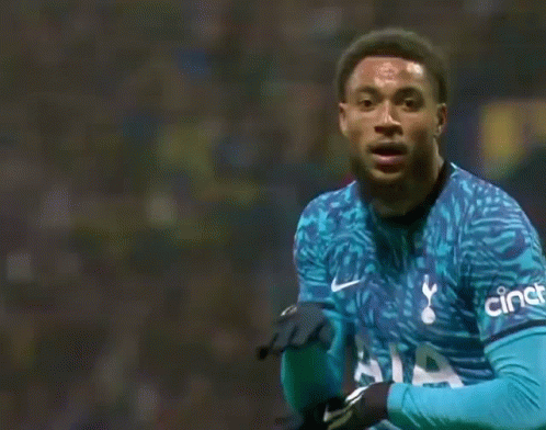 Soccer Player in Blue Tottenham Shirt