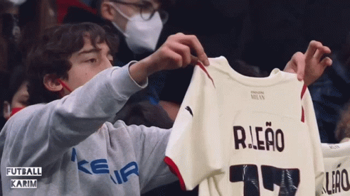 Soccer Player In Emirates Fly Better Jersey Making Heart GIF