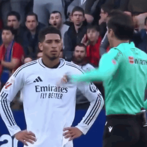 Soccer Player in Emirates Fly Better Jersey Touched