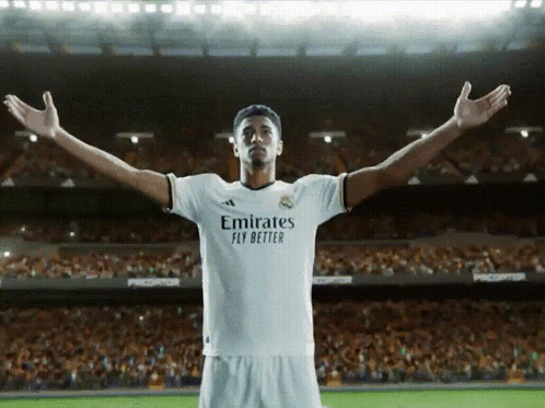 Soccer Player in Emirates Fly Better Shirt