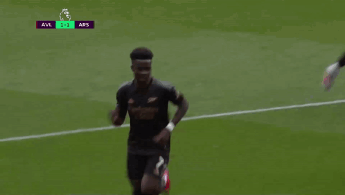 Soccer Player in Emirates Jersey Dancing