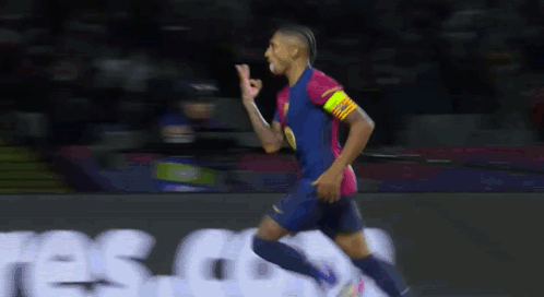 Soccer Player in FC Barcelona Jersey Running