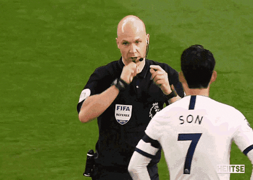 Soccer Player in FIFA Referee Shirt