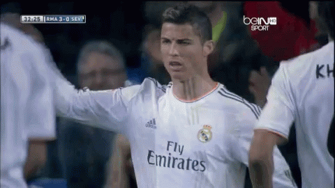 Soccer Player in Fly Emirates Jersey Facing Crowd