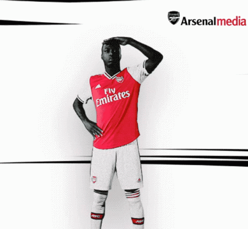 Soccer Player in Fly Emirates Jersey in Front of Arsenal Media