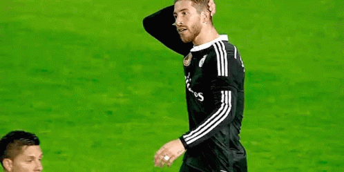 Soccer Player in Fly Emirates Jersey