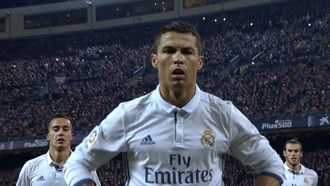 Soccer Player in Fly Emirates Shirt Celebrates