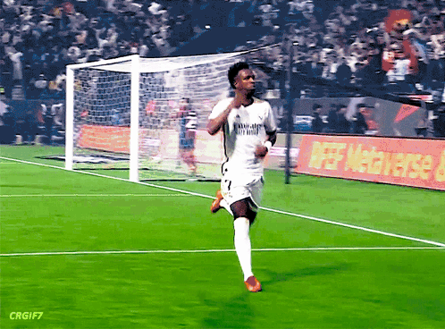 Soccer Player in Fly Emirates Shirt Running