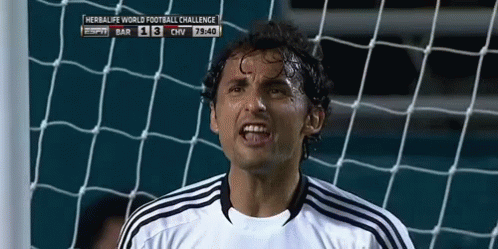 Soccer Player in Front of Herbalife Scoreboard