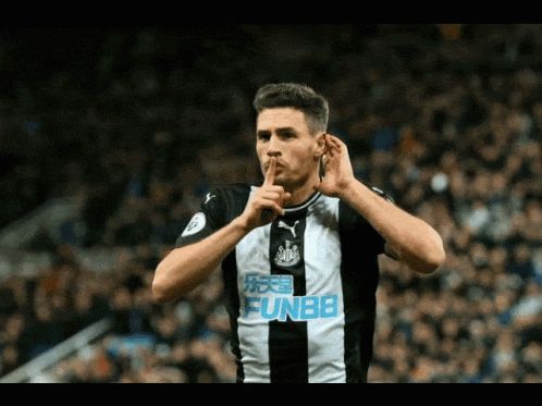 Soccer Player in Funbb Jersey Shushing
