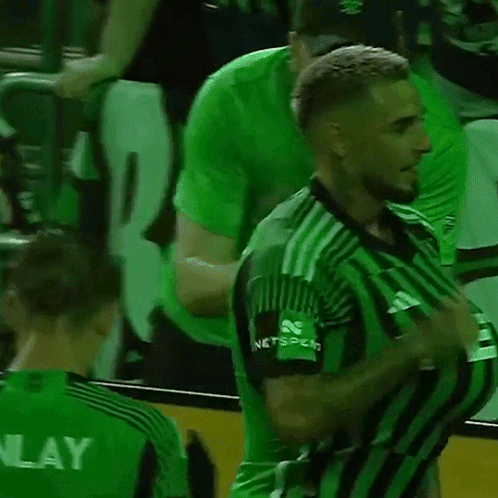 Soccer Player In Green And Black Striped Jersey Thumbs Up GIF