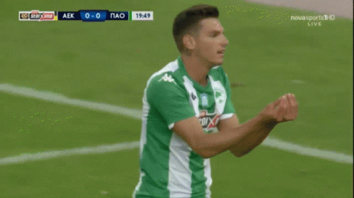 Soccer Player in Green and White Jersey Pas Kala