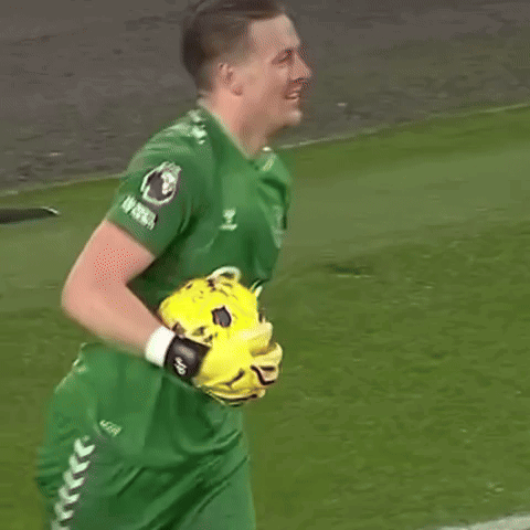 Soccer Player in Green Cafe Shirt