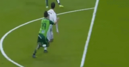 Soccer Player in Green Jersey Number 1