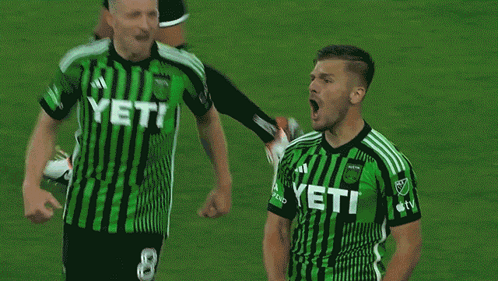 Soccer Player In Green Jersey Number 14 GIF