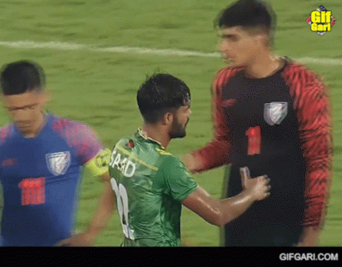 Soccer Player in Green Jersey Number 20