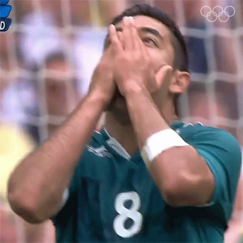 Soccer Player in Green Jersey Number 8