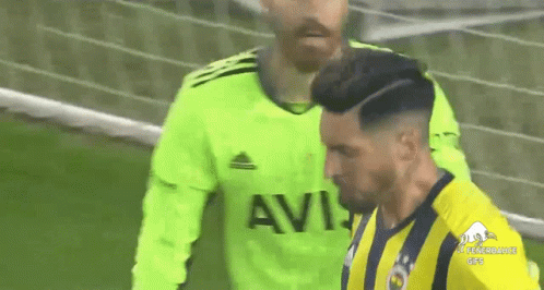 Soccer Player In Green Jersey Saying Avis
