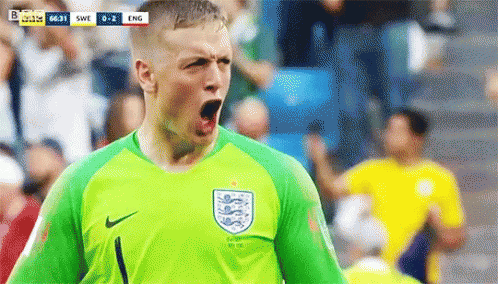 Soccer Player in Green Jersey Screaming