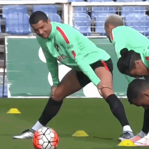 Soccer Player in Green Jersey With Paris