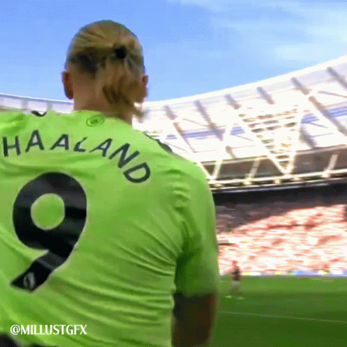 Soccer Player in Green Shirt Number 9