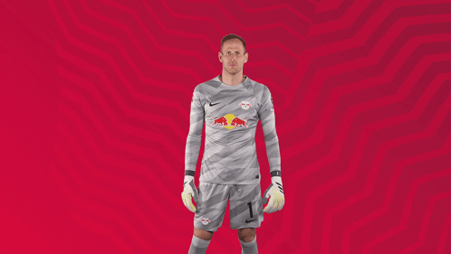 Soccer Player in Grey Jersey with Red Bull