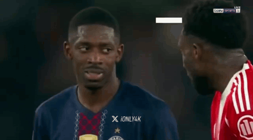 Soccer Player in Ionly4k Shirt Talking to Another