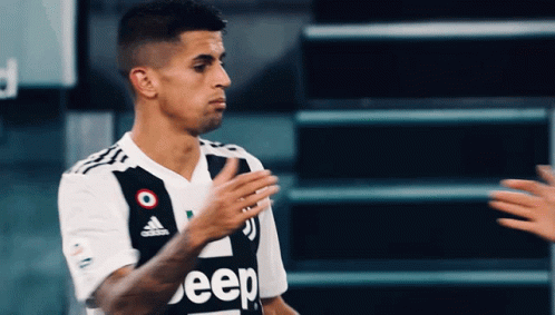 Soccer Player in Jeep Jersey Applauds