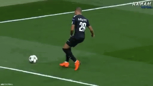 Soccer Player in Jersey 29 Kicking Ball