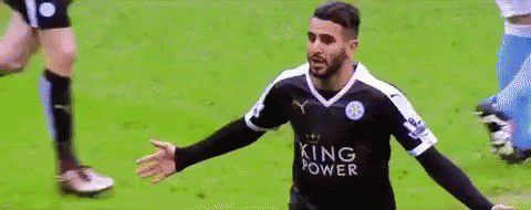 Soccer Player in King Power Jersey Celebrating Goal