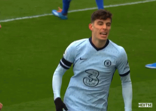 Soccer Player in Light Blue Jersey Number 8 Running