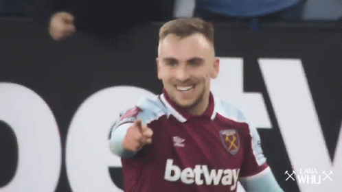 Soccer Player in Maroon Betway Jersey