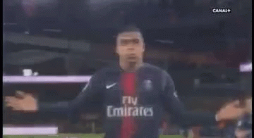 Soccer Player in Nike Jersey in Front of Crowd