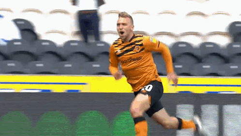 Soccer Player in Number 10 Jersey Running