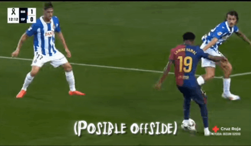 Soccer Player in Number 19 Jersey Kicks Ball