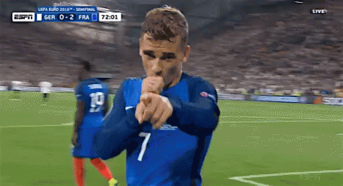 Soccer Player in Number 7 Jersey Pointing at Camera